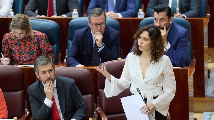 La presidenta de la Comunidad de Madrid, Isabel Díaz Ayuso, interviene durante una sesión de control al Gobierno de la Comunidad de Madrid